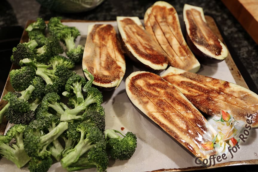 Brush the eggplant with the combination of the soy sauce and barbeque sauce. Spray the eggplant and broccoli florets with olive oil.