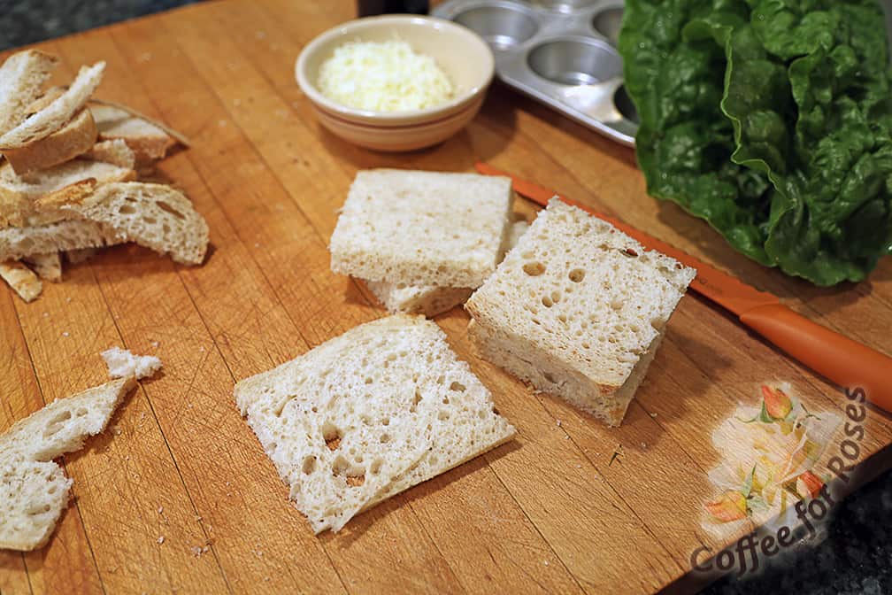Cut the bread into squares, removing the crust. Save what you cut off for making bread crumbs or croutons.