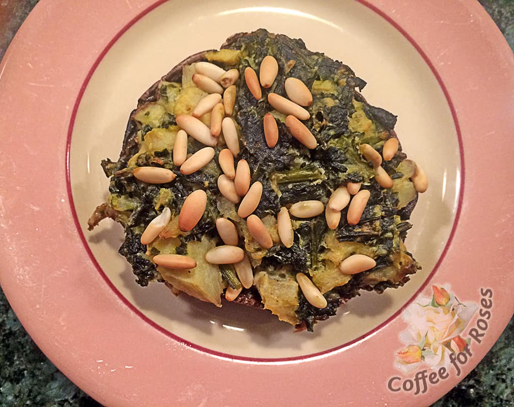 Here is how the finished stuffed mushroom looks when ready to serve. The pine nuts add a very pleasing texture/crunch so if you don't like pine nuts, substitute chopped almond s or cashews instead.
