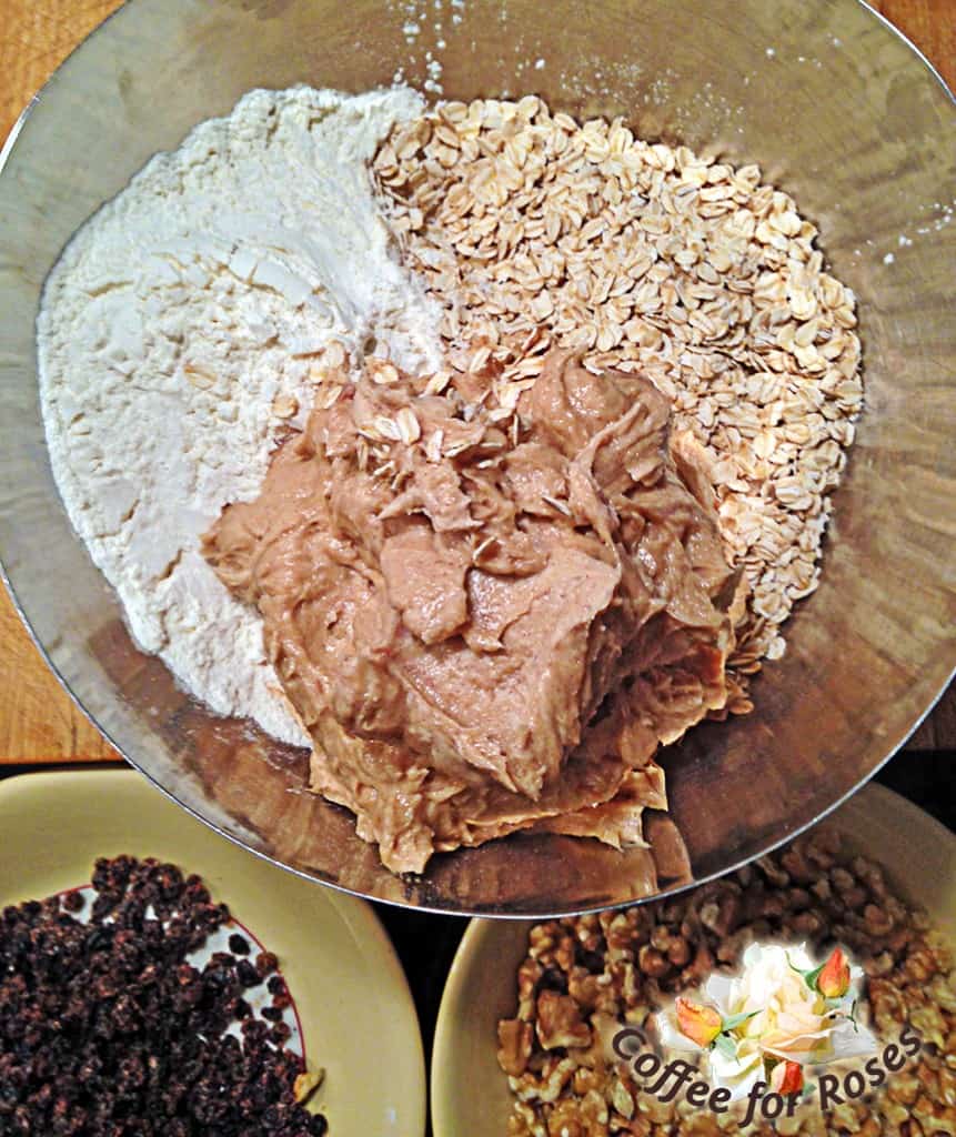 Turn the butter-sugar-egg mixture into the bowl with the flour and oats.
