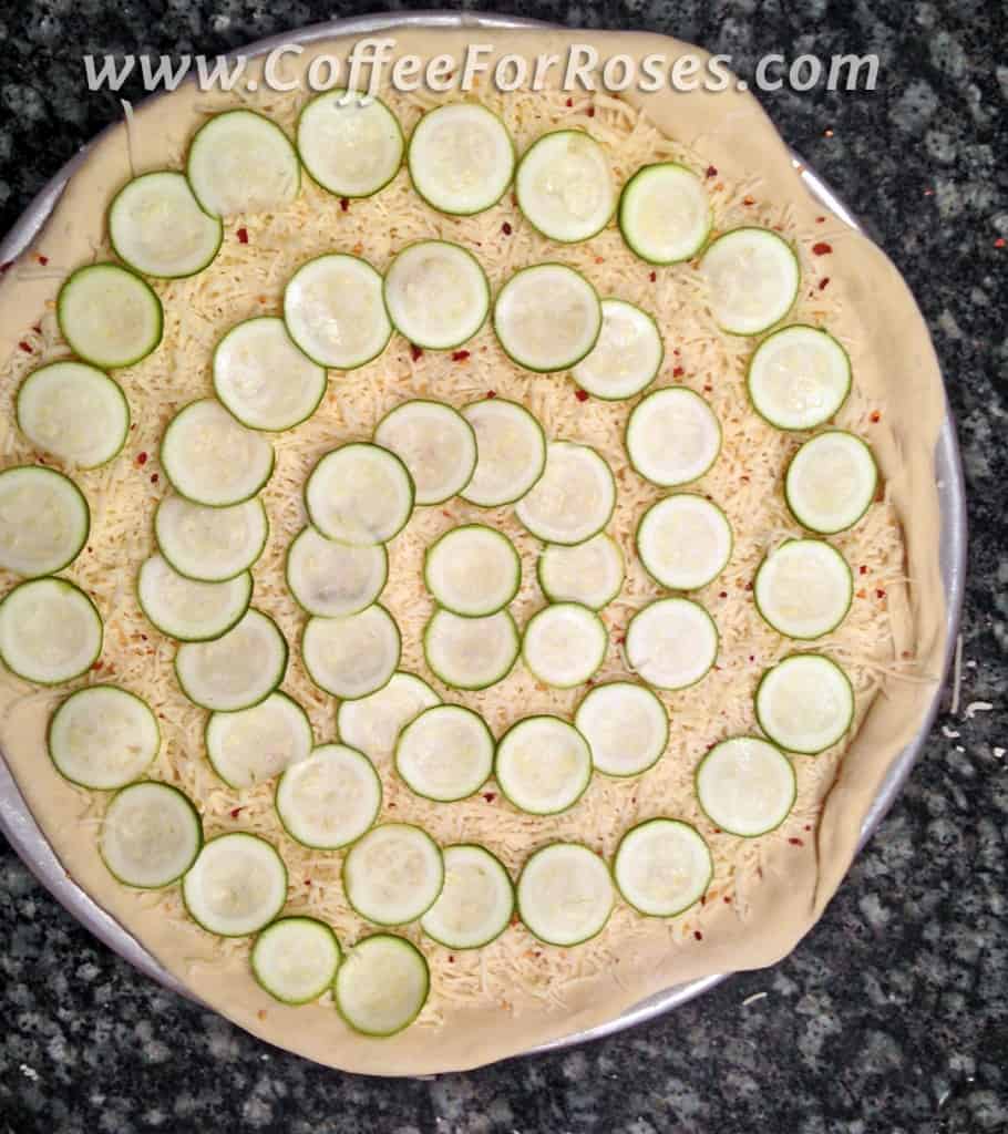 Since I sliced the zucchini very thinly it can go on the dough raw.