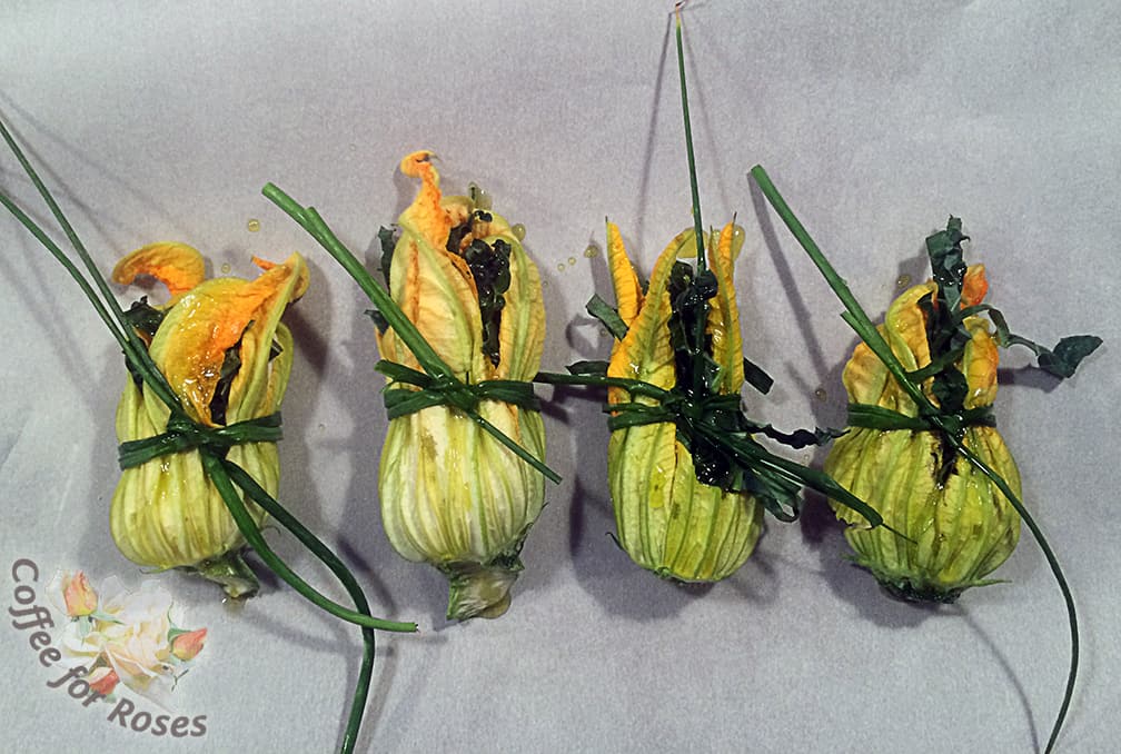 Finally, I tied each closed with a couple of chives. This was, frankly, more for appearance than anything else although the chives did add a nice flavor accent to the dish. The flower packets were put on a parchment-lined cookie sheet into the oven which was heated to 375 degrees.