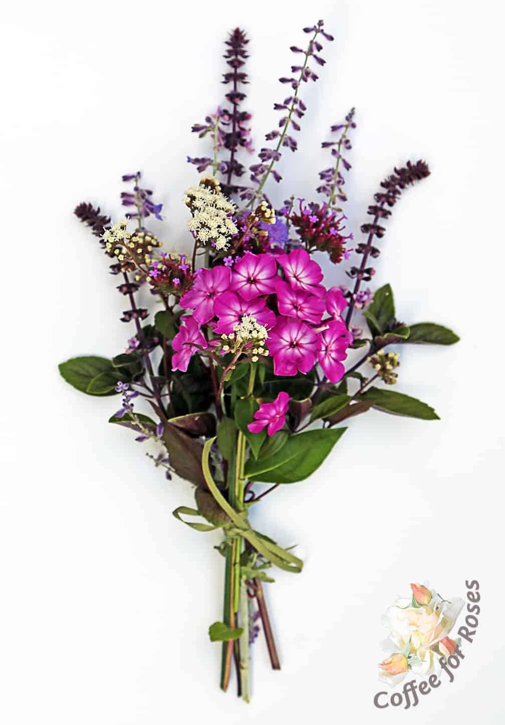 This bouquet has a sprig of Volcano Pholox, some African Blue Basil and a stem of Vitex.