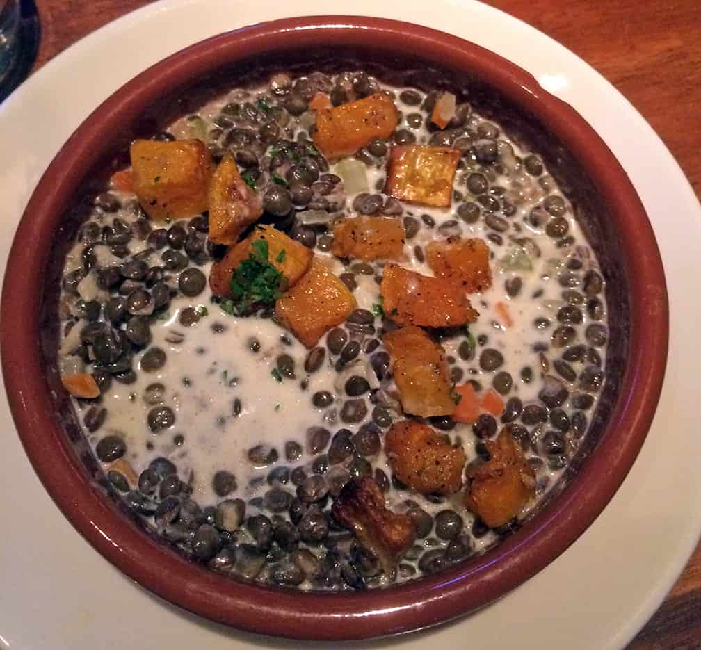 We ate this dish on every single visit. Tiny French lentils cooked but not mushy, I think with shallots, heavy cream, salt, and sweet winter squash. 