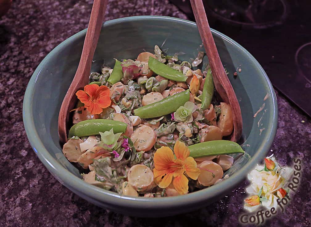 Garnish with a few fresh snap peas and edible flowers such as nasturtiums. Serve immediately or refrigerate until meal time.