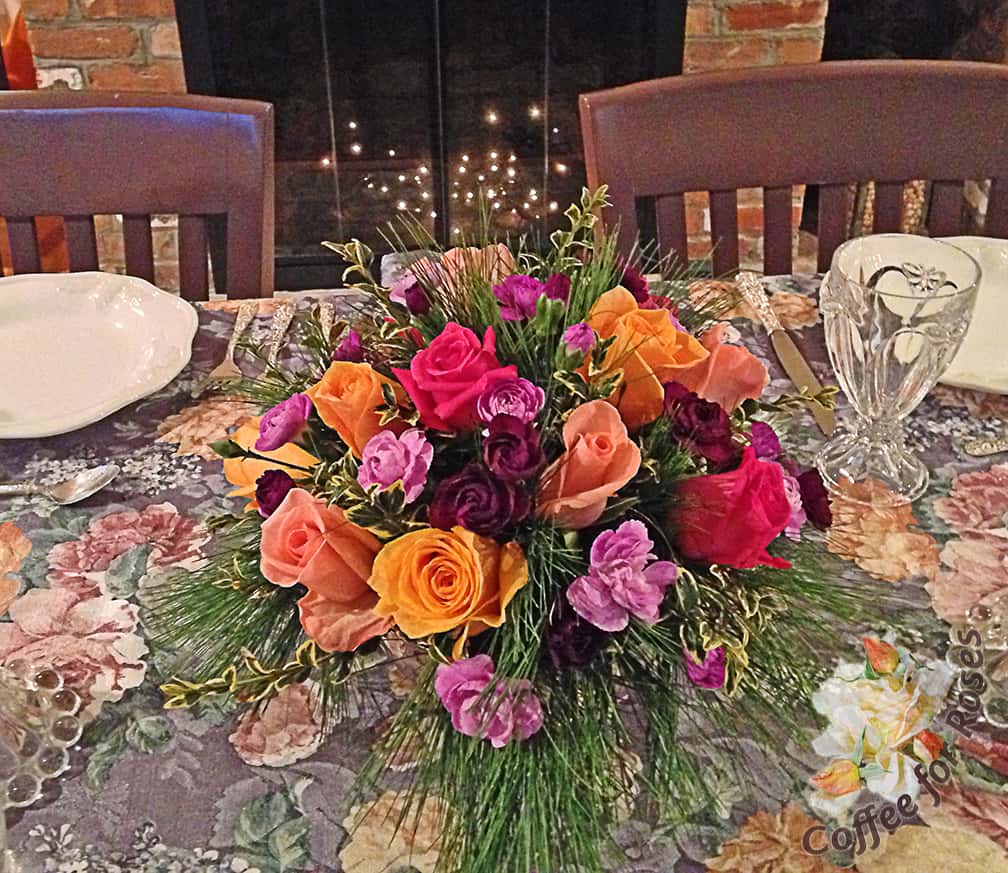 Here's an arrangement I did last year using roses, carnations, white pine and 