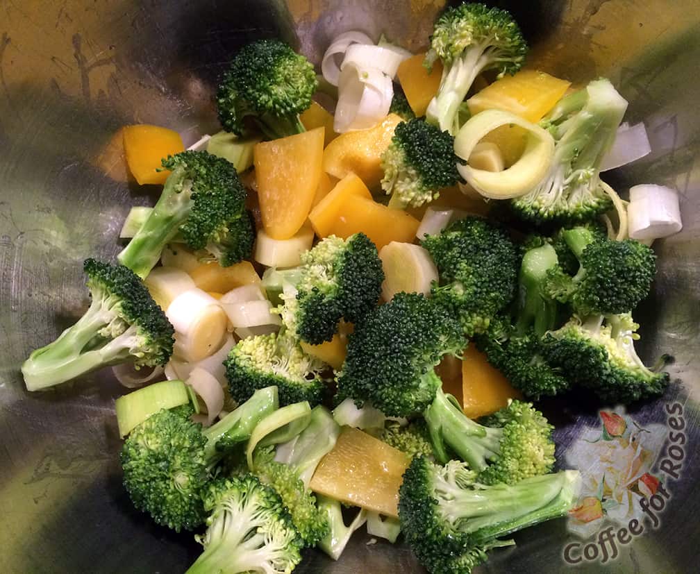 Chop up all the veggies into bite-sized pieces. Drizzle with about 1 tablespoon of olive oil and toss.