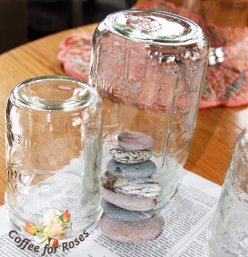 Practice stacking your stones first. It's helpful to have something like a mason jar to support the pile while you work. 